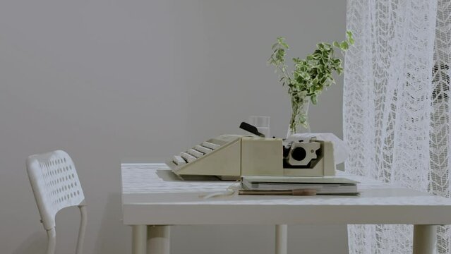 Table of a playwright during summer morning. Closeup