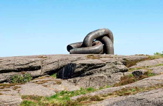 A Broken Chain monument on North Sea coast in Kvernevik suburb, Stavanger, Norway, May 2018