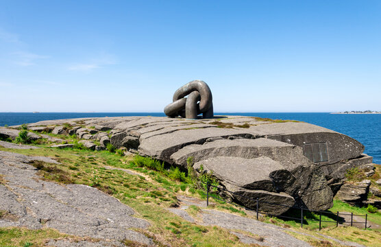 Brutt Lenke or Broken Chain monument on top of a large rock on North Sea coast in Kvernevik suburb, Stavanger, Norway, May 2018