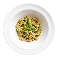 Isolated portion of pesto fusilli pasta on white background