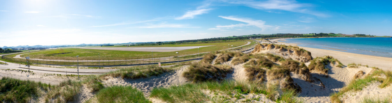 Panoramic view to Sola airport runaway near the white sand beach strip, Stavanger, Norway, May 2018