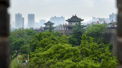 Fototapeta na wymiar Xi'an, China. The 600-year-old Ming Dynasty architecture bell tower view in summer in Xi'an, Shaanxi, China