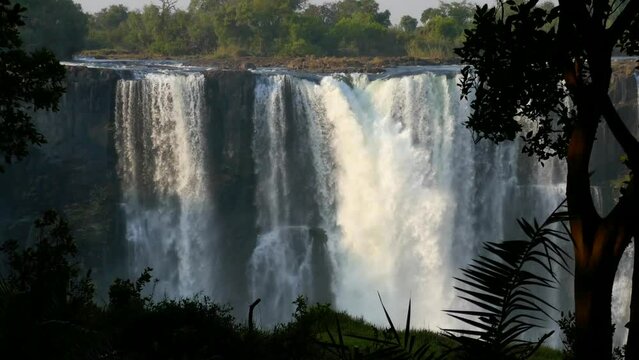 The great Victoria falls waterfall in Zimbabwe at the border with Zambia. New 7 Natural Wonders of the World. Mosi-oa-Tunya on river Zambezi.
