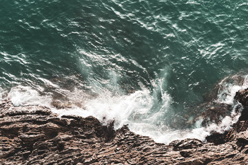 waves crashing on rocks