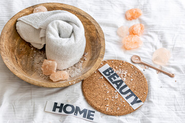 Spa composition with towel and sea salt.