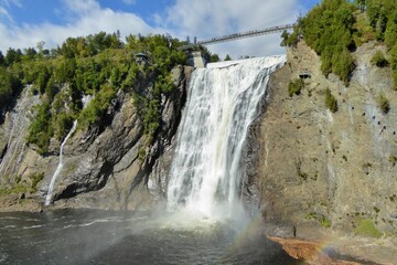 Obraz premium Montmorency Fall is a waterfall in the Canadian province of Quebec, which forms the mouth of the Montmorency River and plunges into the St. Lawrence River.