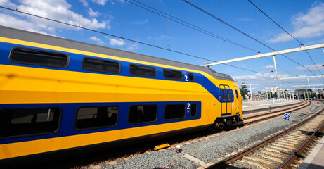 Dutch Intercity trains at the platform of a train station in The Netherlands.