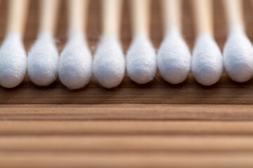 wooden cotton buds on a mat