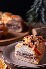 Three kings day cake or bread on rustic background, top view