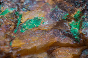 Green mineral Gildmanite on a brown variety of quartz