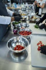 strawberries in a metal bowl on the table, close-up