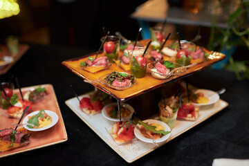 Delicious appetizers, sliced jamon, vegetables and flatbread .snacks 