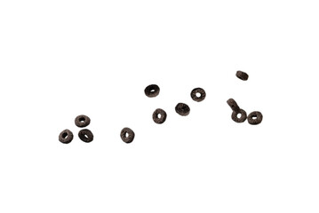 Chocolate rings cereal spill out into a bowl. Breakfast.