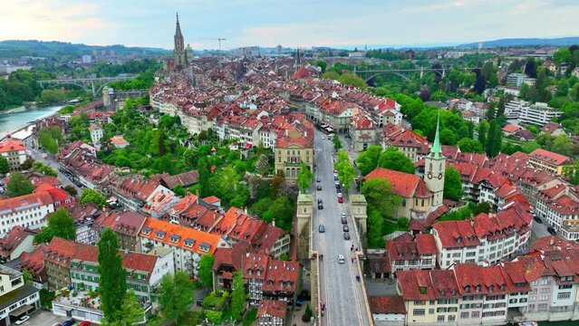Swiss capital city of Bern from above, flying towards Bern historical city centre, aerial view of Bern, touristic destination in Switzerland 