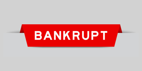 Red color inserted label with word bankrupt on gray background