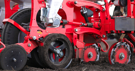 Obraz na płótnie Canvas Agriculture Farm Tractor Seeding Machine Field Seeder Village Planter Rural Working Combine Tillage Plowing Agricultural Equipment Season Sowing Grain Spring time Process Planting Seeds 