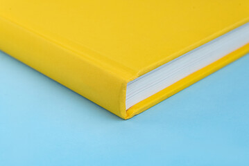 Physical paper book over background - closeup