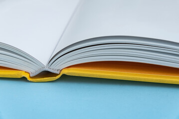 Physical paper book over background - closeup