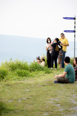 both male and female people walking and sitting on vacation with family Stay with beautiful nature, bright sky, green trees, good atmosphere. Khao Yai Thiang, Thailand Date 28-05-2022