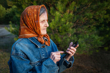Elderly woman phone pressing