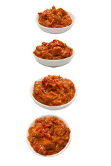 Vegetable stew in a bowl isolated on white background.