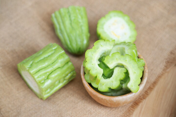 bitter gourd slices in bowl for cooking in kitchen as a good health care food eating