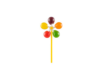Colorful rainbow fruit windmill lollipop.