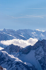Fototapeta na wymiar View from the Zugspitze to the surrounding mountain peaks (Tyrol, Austria/ Bavaria, Germany)