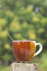 Ceramic coffee cup with bokeh