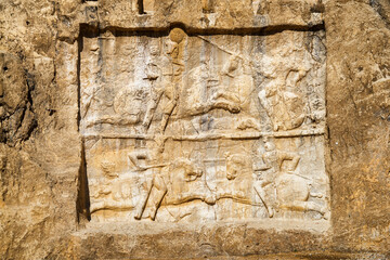 Original bas-relief at ancient necropolis Naqsh-e Rustam, Iran