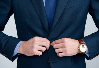 cropped man in formal suit with luxury wristwatch