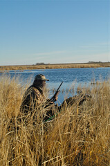 A hunter waiting for waterfowl 