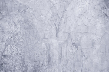 Concept of a plain white plastered brick wall with cracks for backgrounds. Patterns and textures for backgrounds. Concrete surfaces are slightly rough. Random seamless wall pattern.