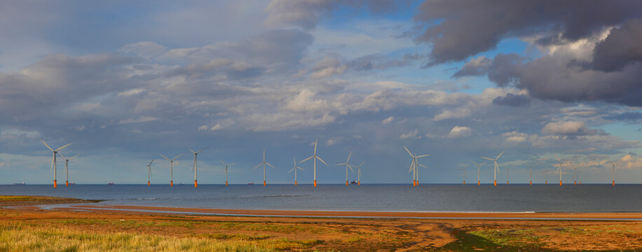 Panoramic view of a Offshore Windfarm off the coast of Middlesbrough, Cleveland, North Yorkshire, England, UK. 