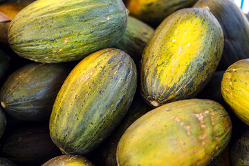Melon background on a shelf in market. Organic eating. Farmer's food.