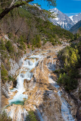 Obraz na płótnie Canvas River surrounded by rock formations (Austria)