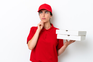 Pizza delivery caucasian woman with work uniform picking up pizza boxes isolated on white...