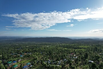clear sky during the afternoon on a hill station during summer in rakh village, himachal pradesh, india