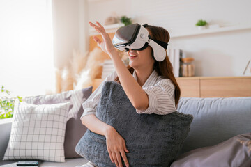 happiness exited asian female teen hand wave along with her virtual concert performance via virtual goggle virtual interactive headset,asia woman stay home innovation technology lifestyle vr at home