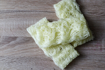 rice noodles isolated on wooden background