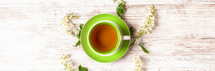 Tea and flowers of cherry