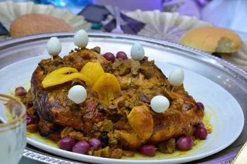 Foto auf Alu-Dibond Moroccan chicken with olives and quail eggs. Moroccan dish served in weddings and events © issam
