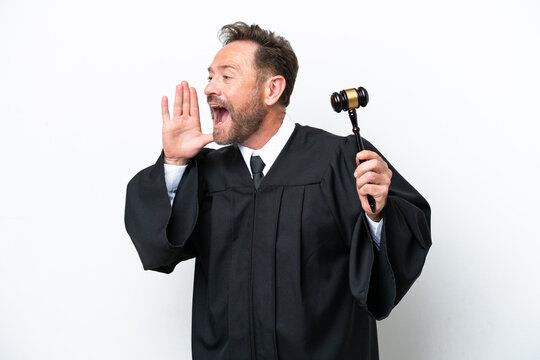 Middle Age Judge Man Isolated On White Background Shouting With Mouth Wide Open To The Side