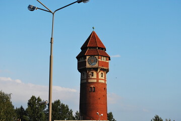water tower and lantern against the sky - obrazy, fototapety, plakaty