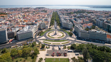Aerial view of Marques de Pombal square and Liberdade Avenue during summer in Lisbon, Portugal. - obrazy, fototapety, plakaty
