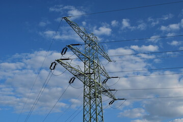 supporting structure, metal power pole, sky background, power engineering