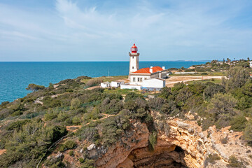 Fototapeta na wymiar Aerial from lighthouse farol de Alfanzina on a cliff in the Algarve Portugal