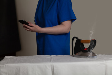 hostess forgot to turn off iron because of social networks..