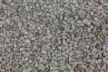 Close view of grey irregular crushed stone