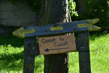 Home Made Coast to Coast Sign Indicating Direction